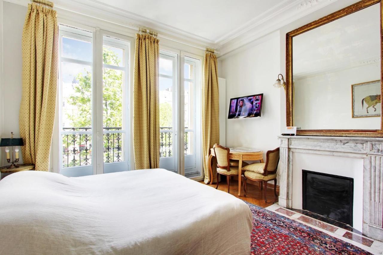 Suite Junior Avec Balcon Et Vue Sur Arc De Triomphe Parijs Buitenkant foto